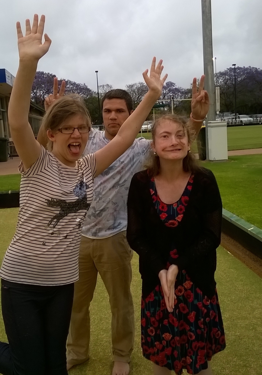 Three young adults who are deaf-blind.