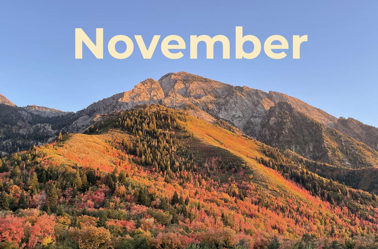 Fall mountain landscape with the word November.