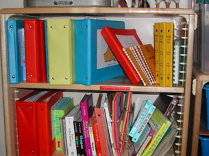 Adapted books stacked on a bookshelf